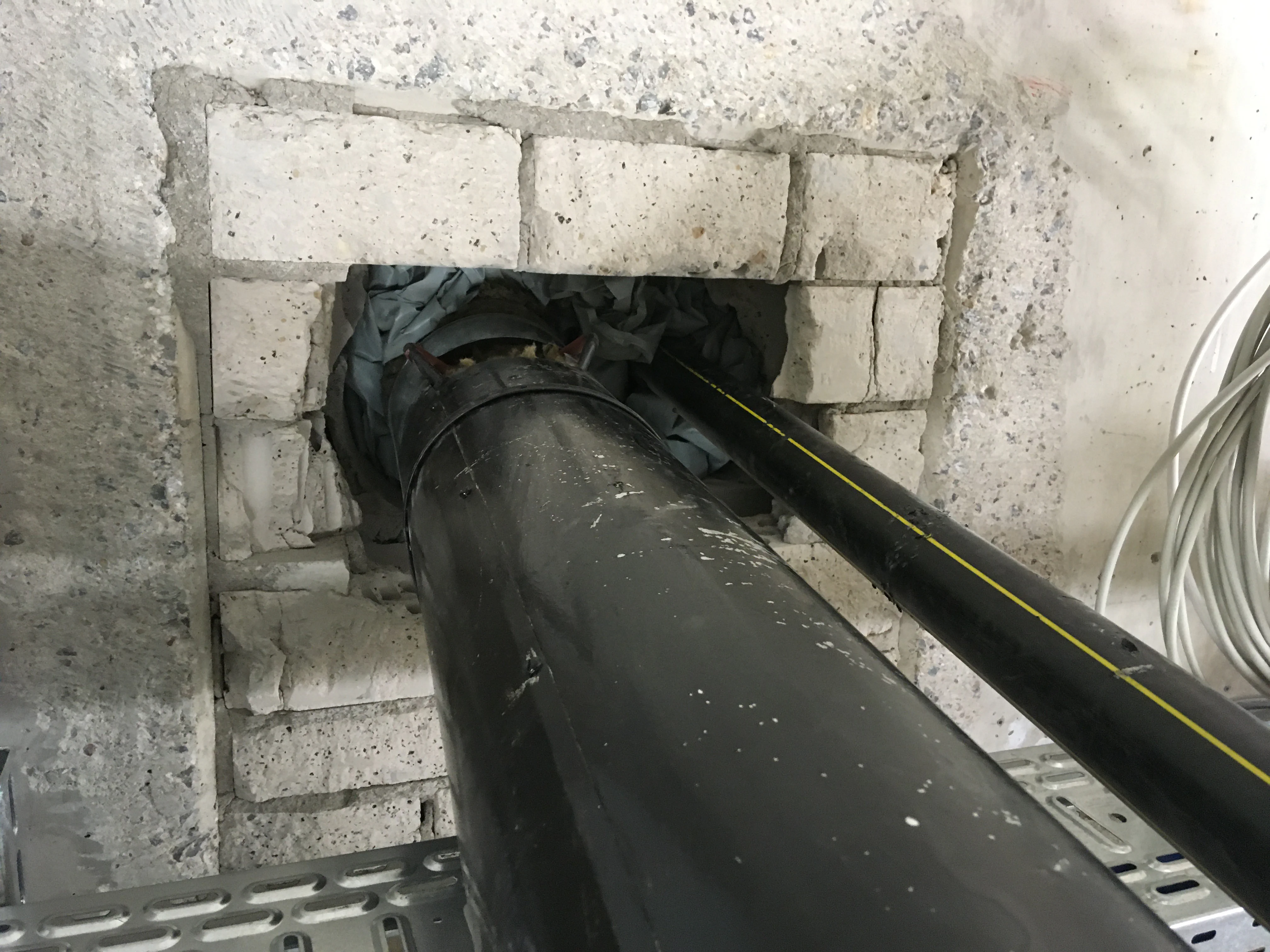 Pipe goes through a wall
